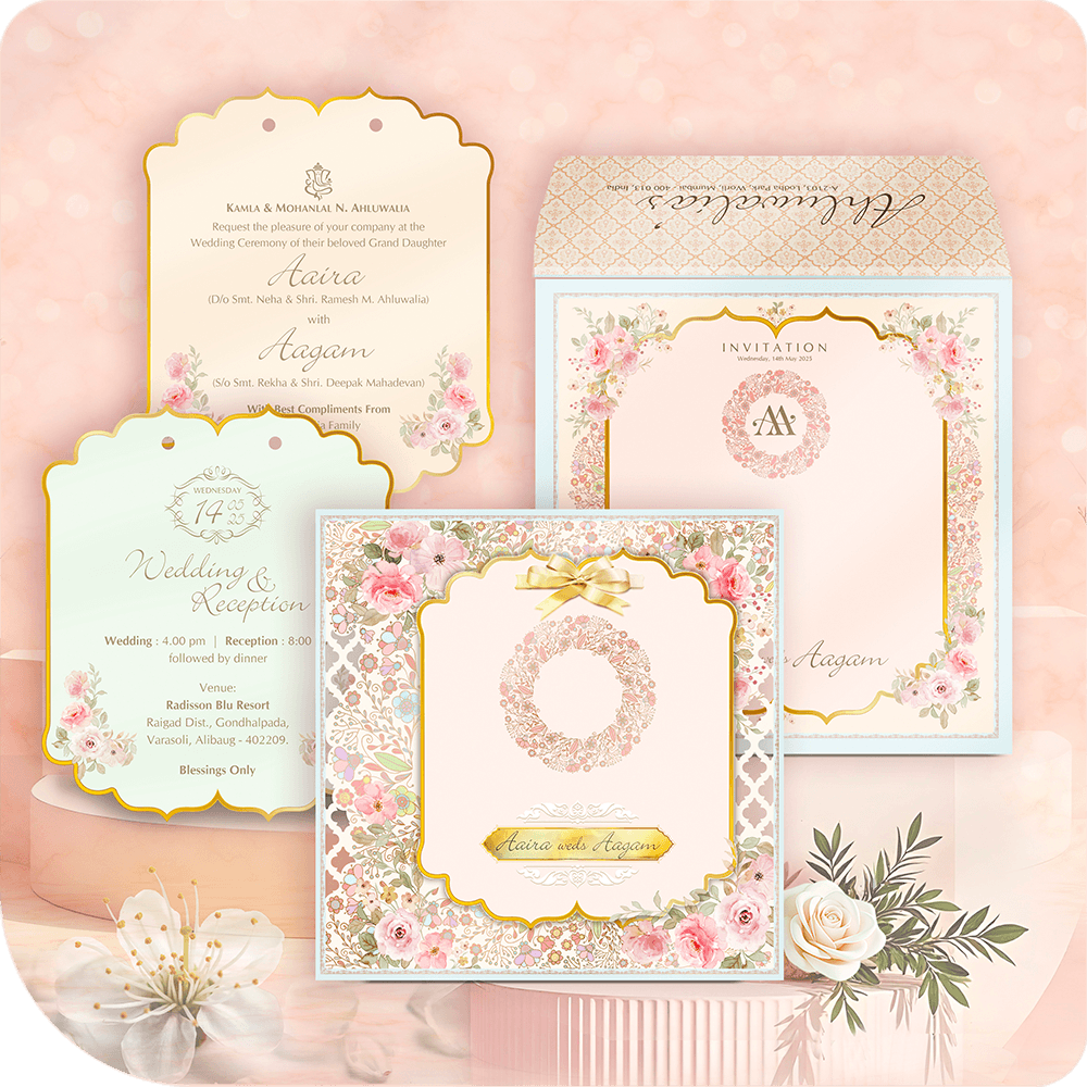 Collection of wedding invitations with floral designs on a soft pink background.