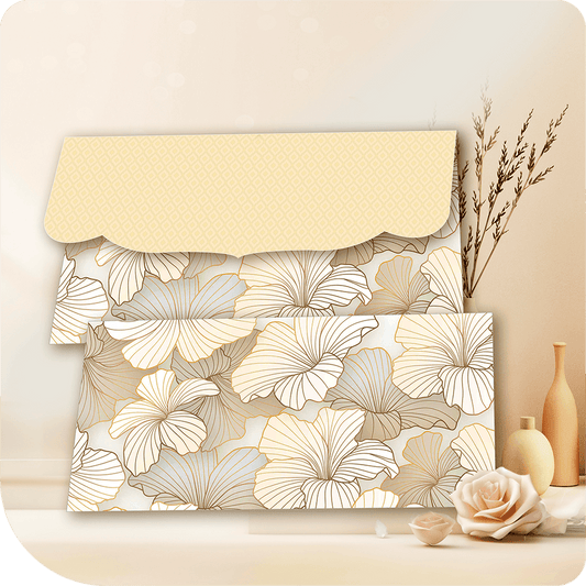 A fashion-forward floral envelope with gold-detailed botanical motifs set against soft beige and muted tones. The stylish scalloped flap features a delicate geometric texture, adding a contemporary yet luxurious touch, perfect for trendy celebrations and premium gifting