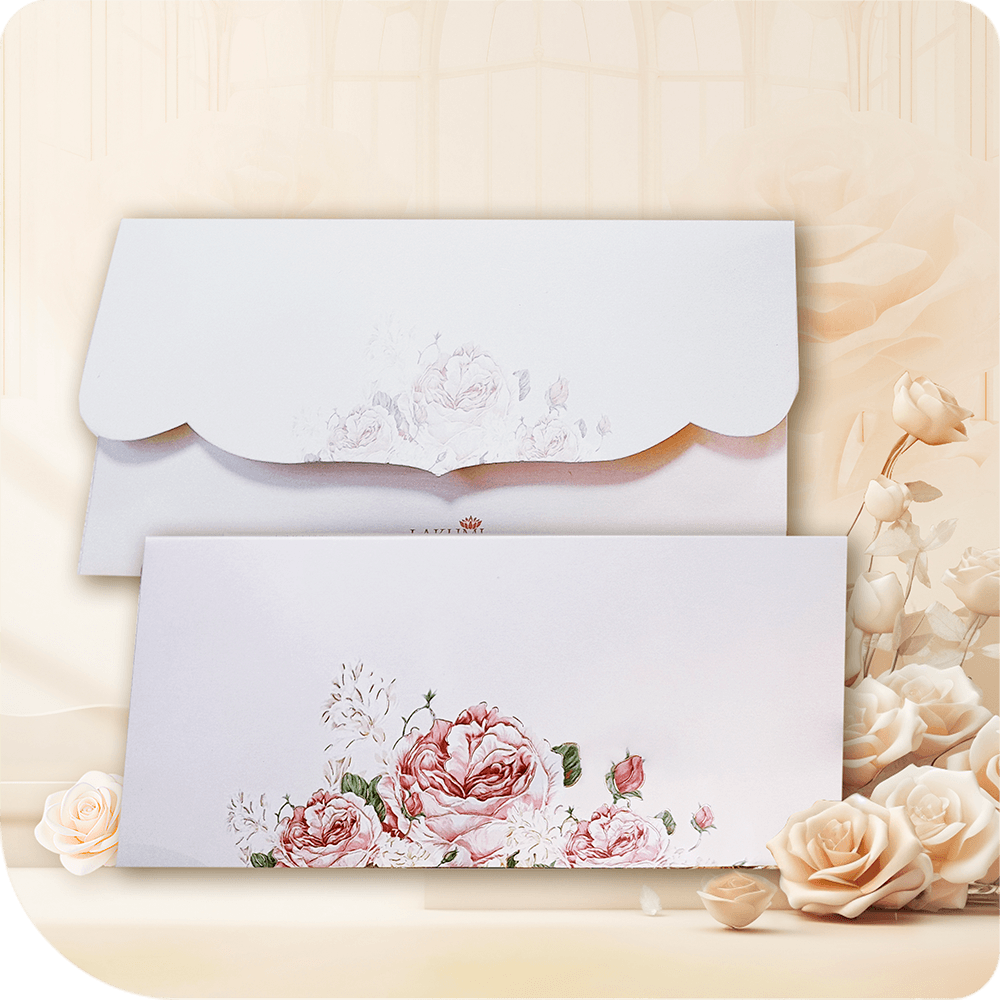 A sophisticated blush envelope adorned with intricately detailed rose artwork, featuring a scalloped flap for an elegant touch perfect for invitations and special occasions.