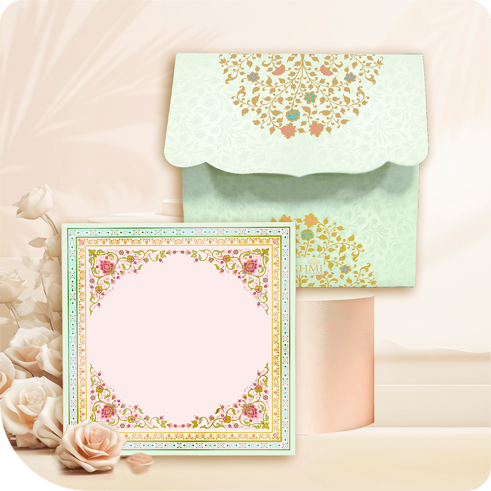 A sophisticated pastel green envelope with gold floral detailing and a scalloped flap, paired with a beautifully bordered insert ideal for invitations and gifting.