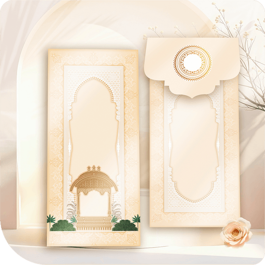 A Rajwadi beige invitation envelope featuring an intricate Jharokha arch, a detailed chhatri pavilion, and an ornamental circular motif on a scalloped flap, exuding Rajasthan’s timeless elegance.