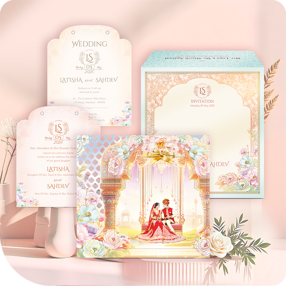 Luxury MDF wedding invitation suite featuring Hindu bride and groom on a floral swing, pastel blue/pink archway, and gold foil accents.