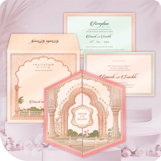 Intricate hexagonal wedding invitation design with central palace arch and column motif in soft peach and pink, printed on premium imported paper, luxury architectural stationery.