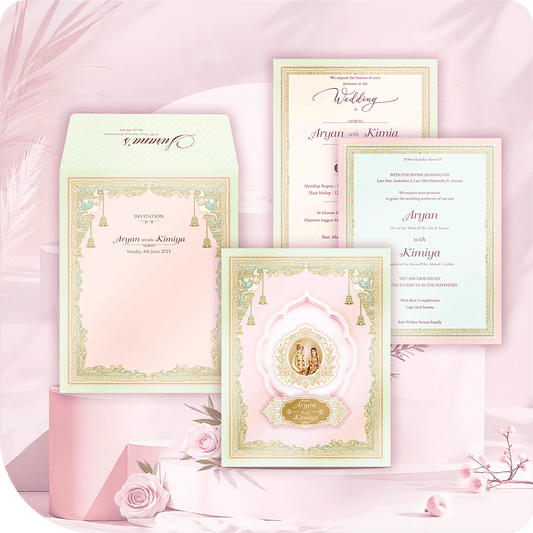 Premium imported paper wedding invitation, central 3D pasteup couple's image, acrylic nameplate, traditional hanging bells motif, luxurious two-leaflet South Asian wedding card suite.
